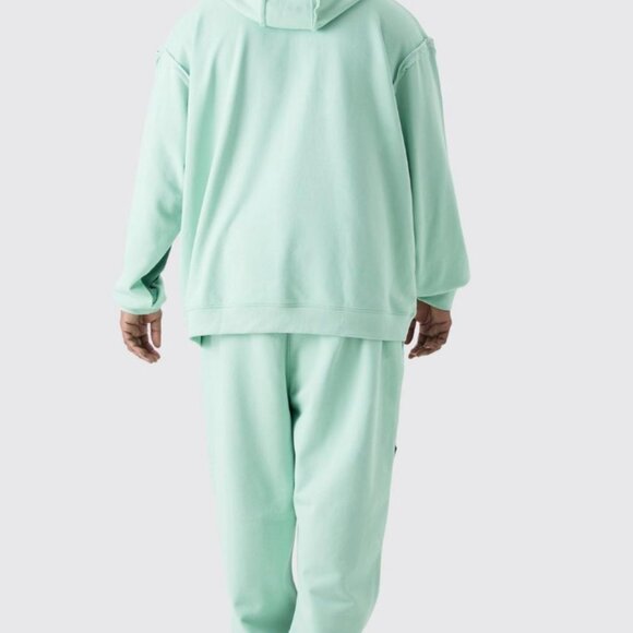 Plus Size Relaxed Fit Joggers with Raw Hem and Panel Detailing - Picture 2 of 3